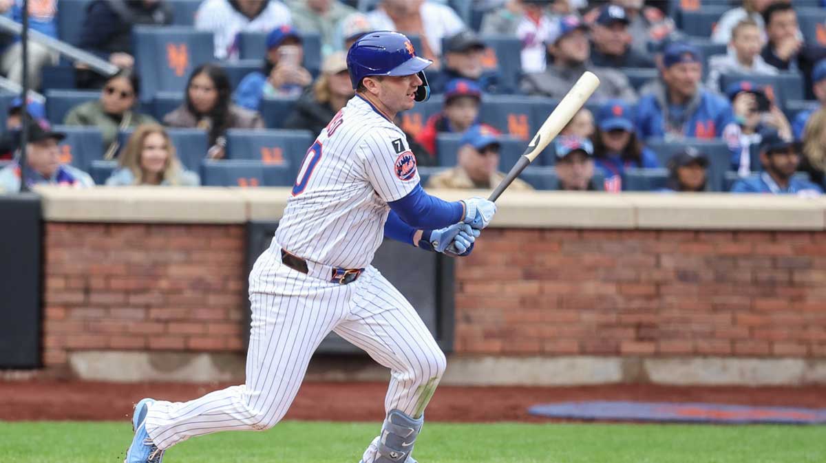 New York Mets first baseman Pete Alonso (20) hits an RBI single in the third inning against the Toronto Blue Jays at Citi Field.