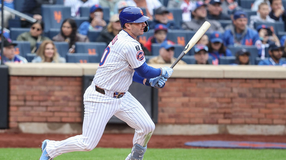 New York Mets first baseman Pete Alonso (20) hits an RBI single in the third inning against the Toronto Blue Jays at Citi Field.