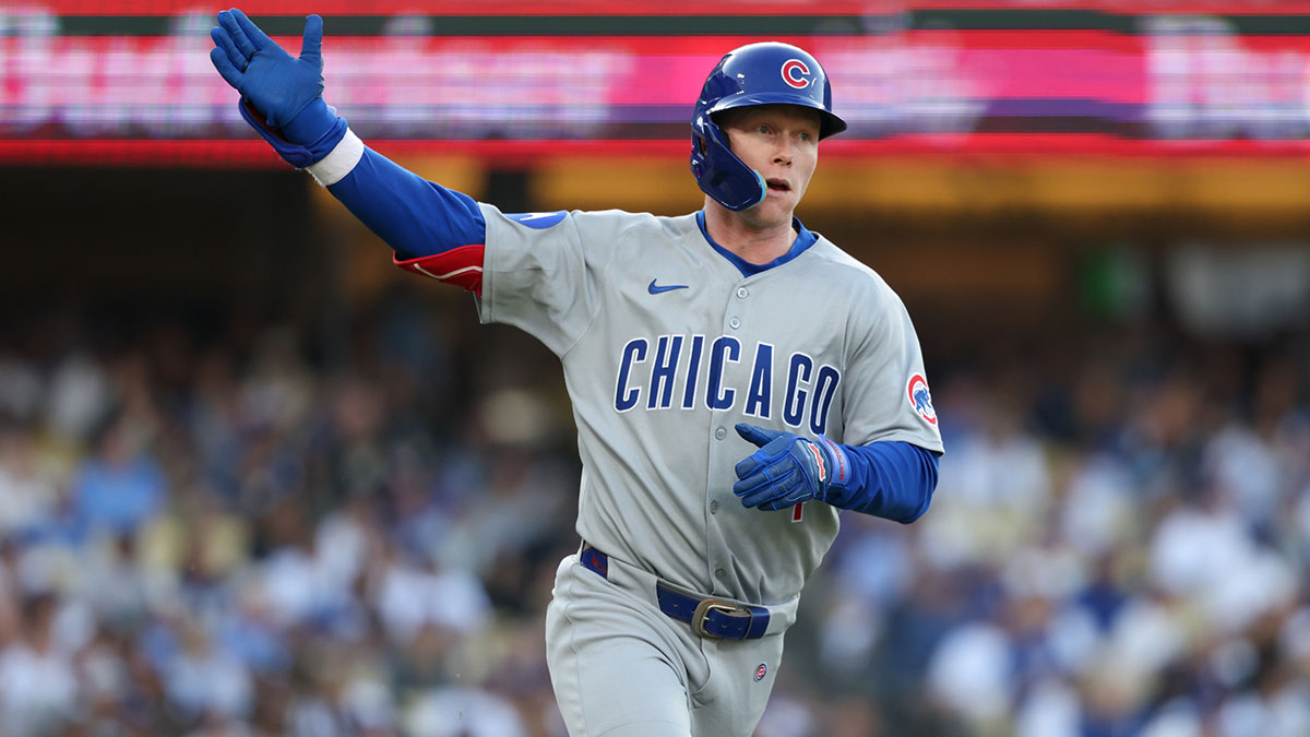 Chicago Cubs outfielder Pete Crow-Armstrong (4) celebrates as he rounds the bases after hitting a solo home run against the Los Angeles Dodgers during the seventh inning of the game at Dodger Stadium.