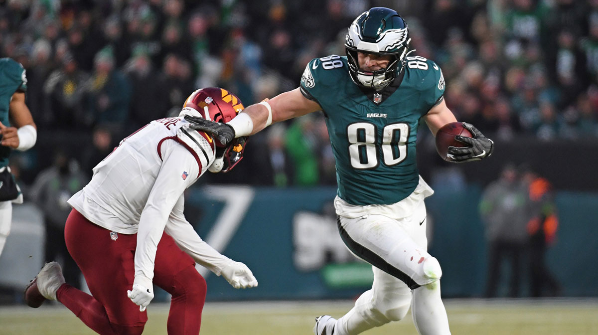 Philadelphia Eagles tight end Dallas Goedert (88) tries to get past Washington Commanders cornerback Mike Sainristil (0) in the NFC Championship game