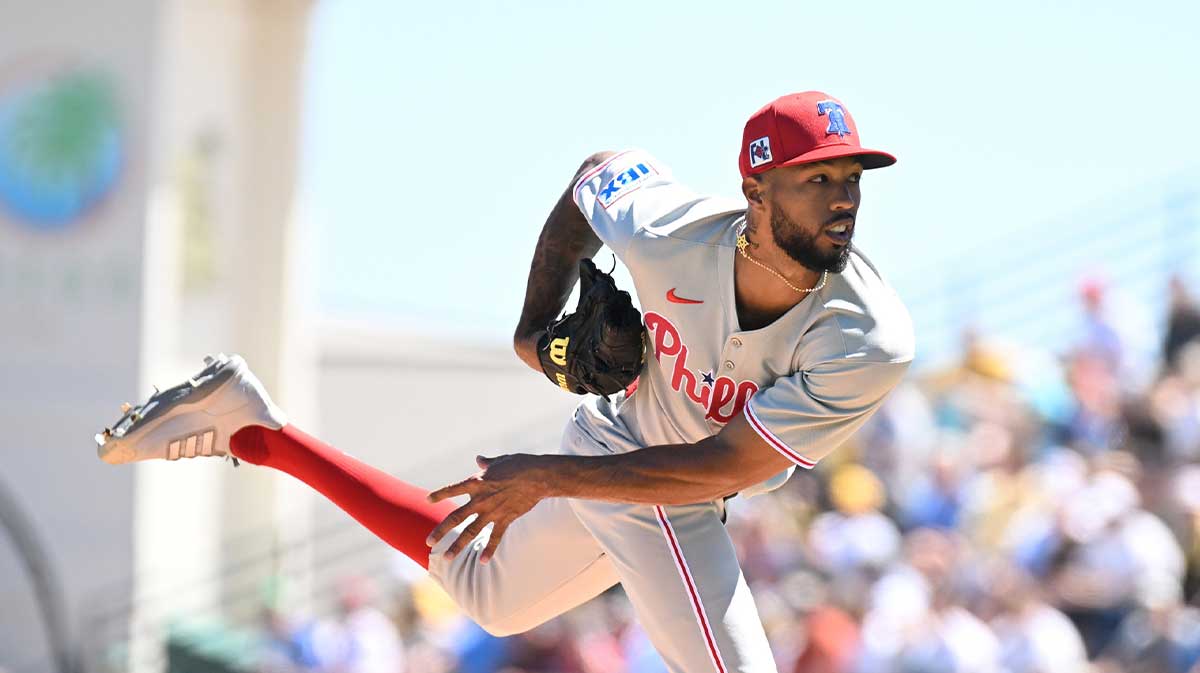 Philadelphia Phillies starting pitcher Christopher Sanchez (61) throws a pitch in the first inning against the Pittsburgh Pirates during spring training at LECOM Park.