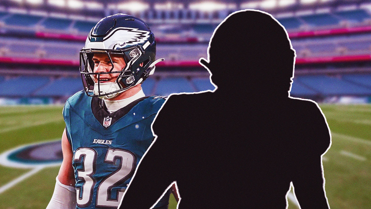 Reed Blankenship next to the blacked-out silhouette of Malakai Starks in front of the Eagles stadium.