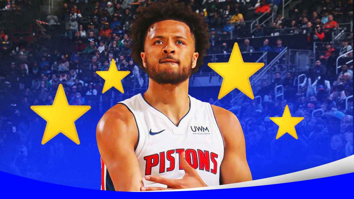 Pistons' Cade Cunningham with stars around him.