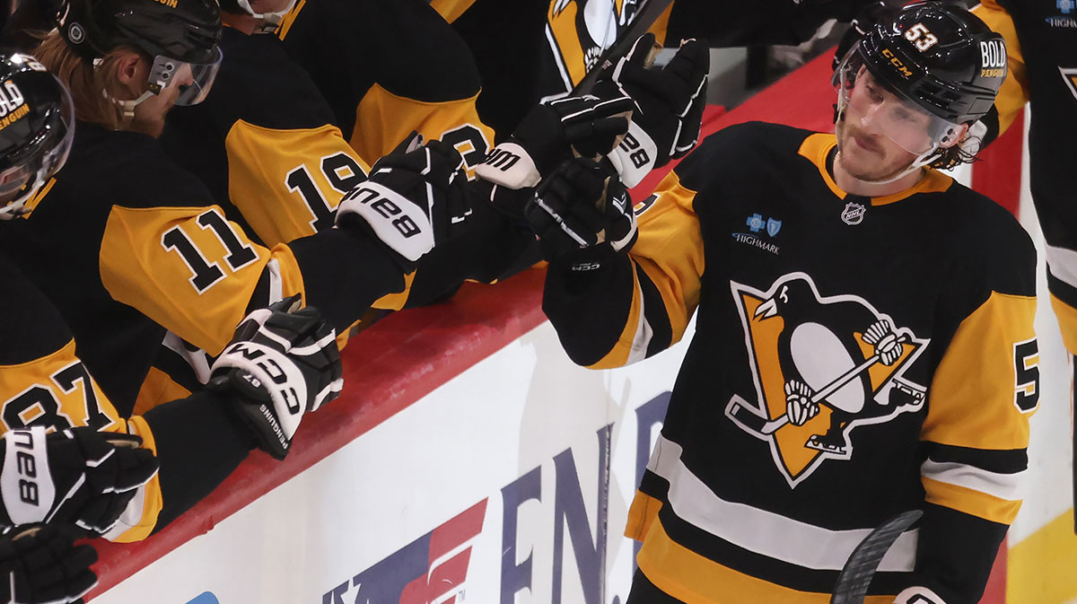 Pittsburgh Penguins center Philip Tomasino (53) celebrates his goal with the Penguins bench against the Washington Capitals during the third period at PPG Paints Arena.