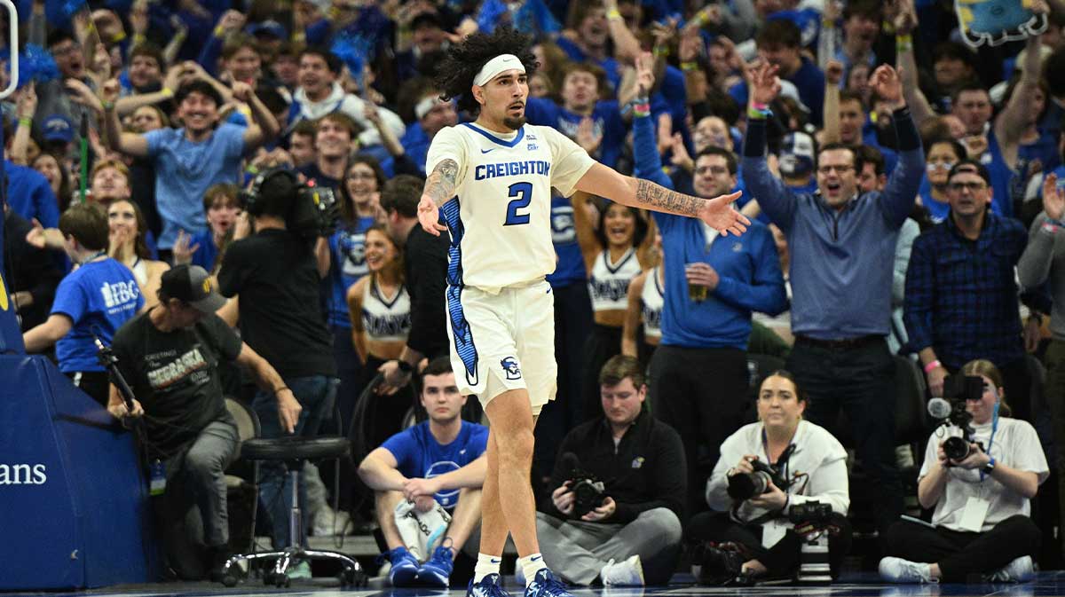 Creighton Bluejays guard Pop Isaacs (2) reacts to the crowd after making a three point basket against the Kansas Jayhawks during the second half at CHI Health Center Omaha.