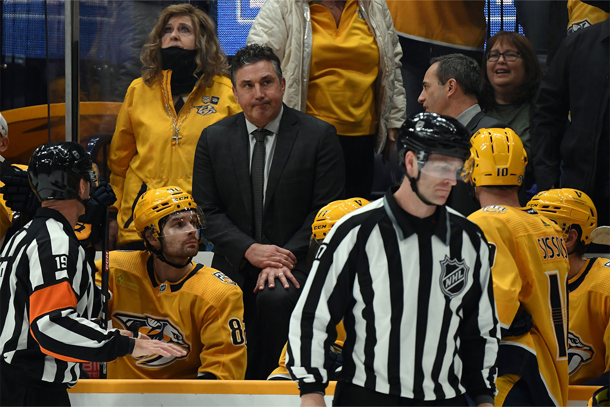 Nashville Predators head coach Andrew Brunette looks on from the bench after a disallowed goal during the first period against the Tampa Bay Lightning at Bridgestone Arena