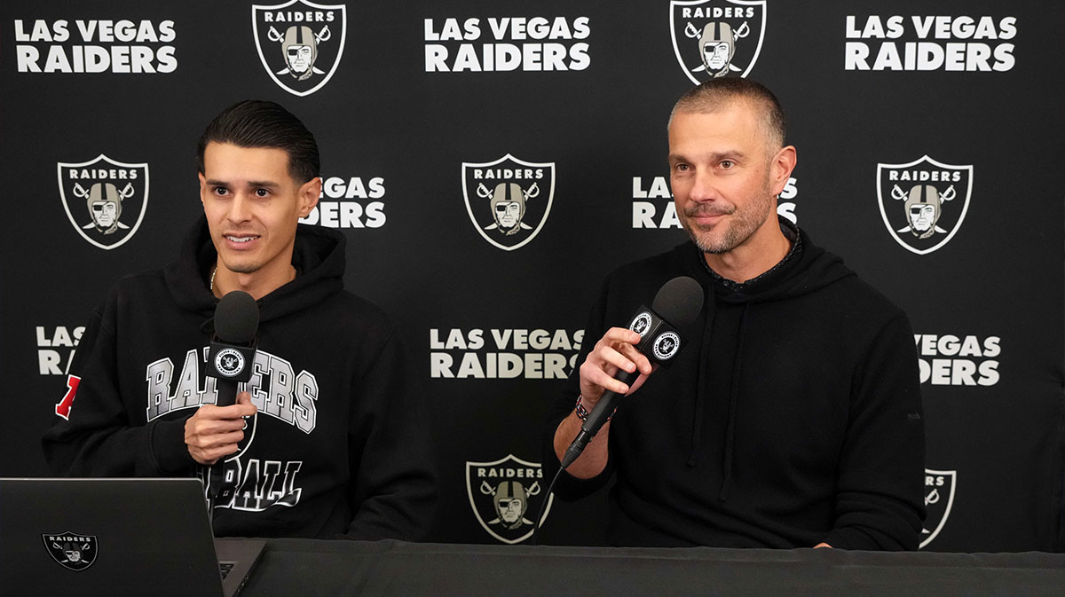 Las Vegas Raiders general manager John Spytek (right) is interviewed by Raiders.com senior writer Eddie Paskal on radio row during the NFL Scouting Combine at the Indiana Convention Center.