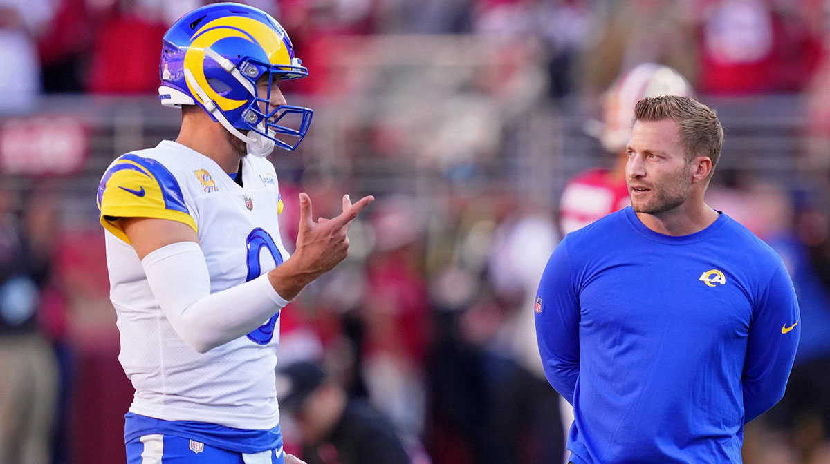 Oct 3, 2022; Santa Clara, California, USA; Los Angeles Rams quarterback Matthew Stafford (left) and head coach Sean McVay talk during warmups before the game against the San Francisco 49ers at Levi's Stadium. Mandatory Credit: Kyle Terada-Imagn Images