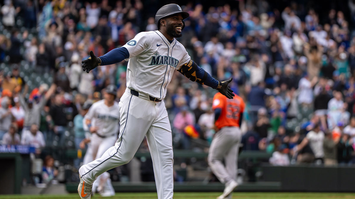 Seattle Mariners left fielder Randy Arozarena (56) celebrates a walk-off walk against the Houston Astros at T-Mobile Park.