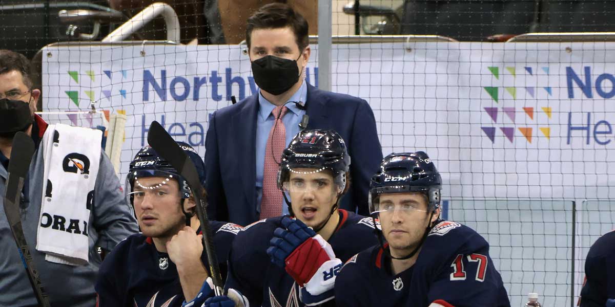 New York Rangers associate general manager Chris Drury works the bench during a game against the Philadelphia Flyers at Madison Square Garden. Due to the NHL COVID-10 protocol, the Rangers coaching staff were not available for tonights game.