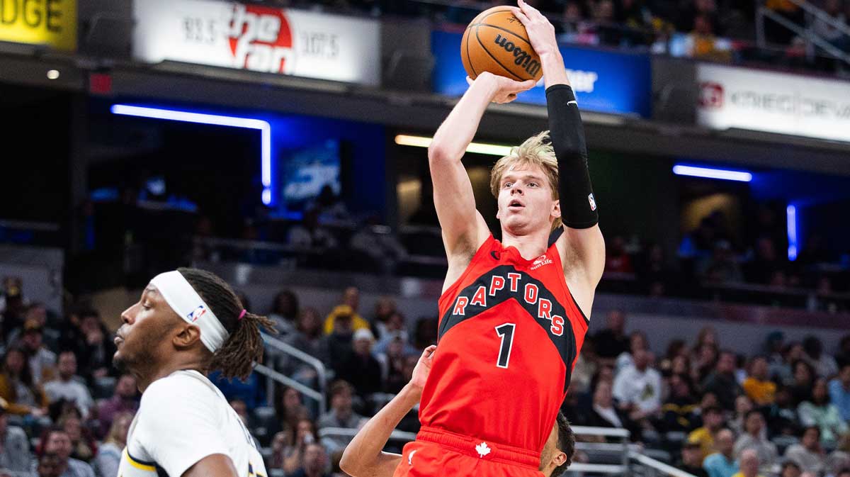Toronto Raptors guard Gradey Dick (1) shoots the ball while Indiana Pacers center Myles Turner (33) defends in the first half at Gainbridge Fieldhouse