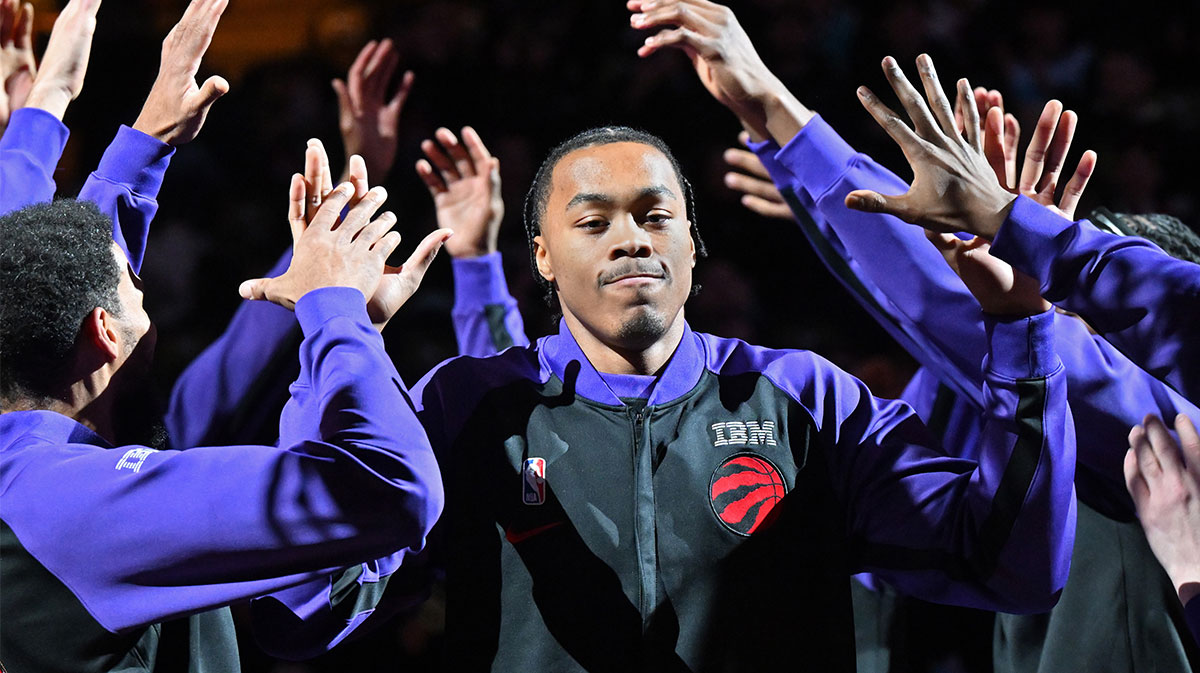  Toronto Raptors forward Scottie Barnes (4) is greeted by team mates during player introductions before tip off against the Charlotte Hornets at Scotiabank Arena.