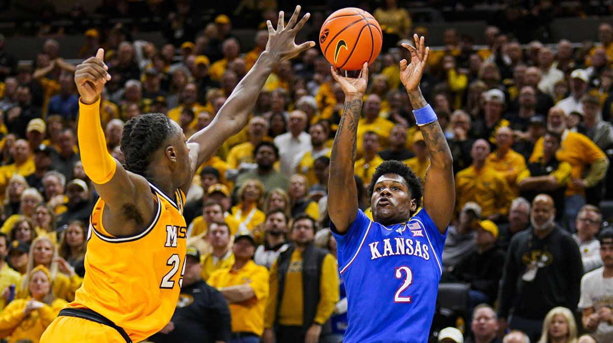 New Ole Miss basketball guard AJ Storr (2) shoots the ball against Missouri Tigers guard Mark Mitchell (25) during the second half at Mizzou Arena.