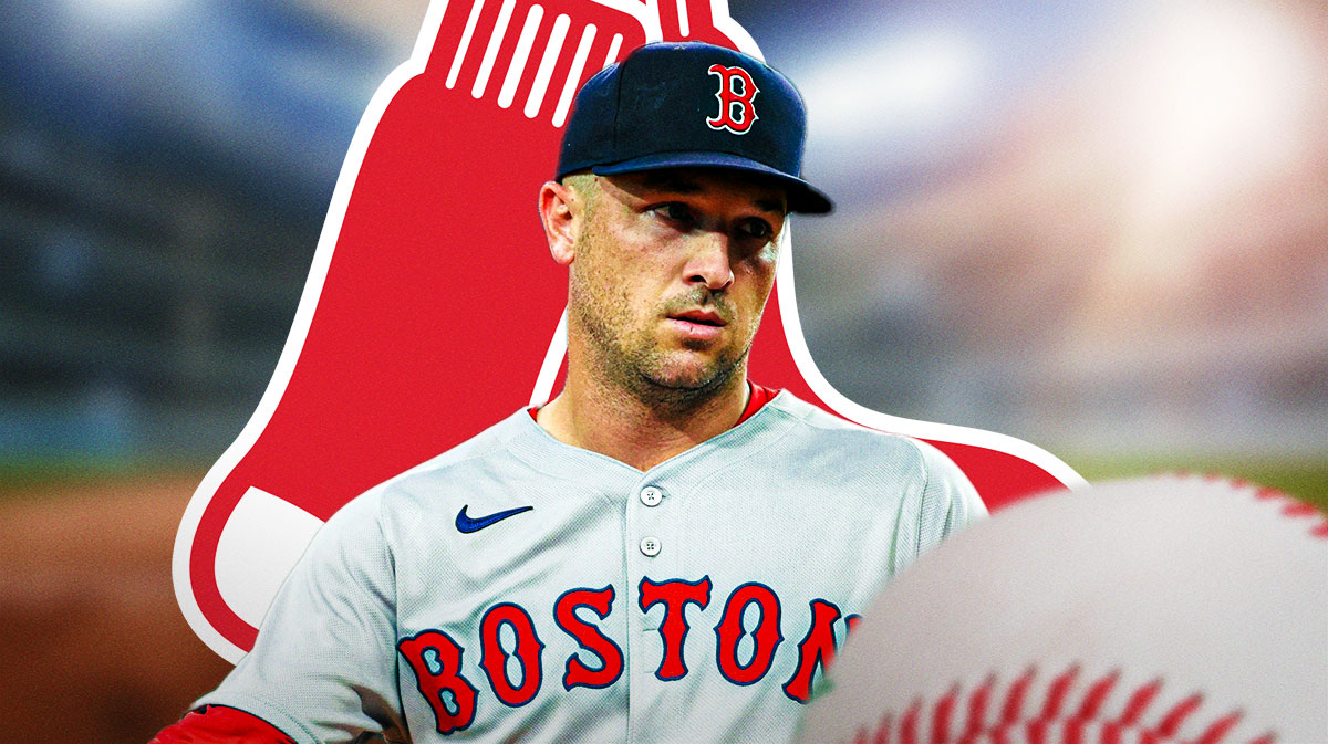 Alex Bregman playing baseball with the Red Sox logo right next to him