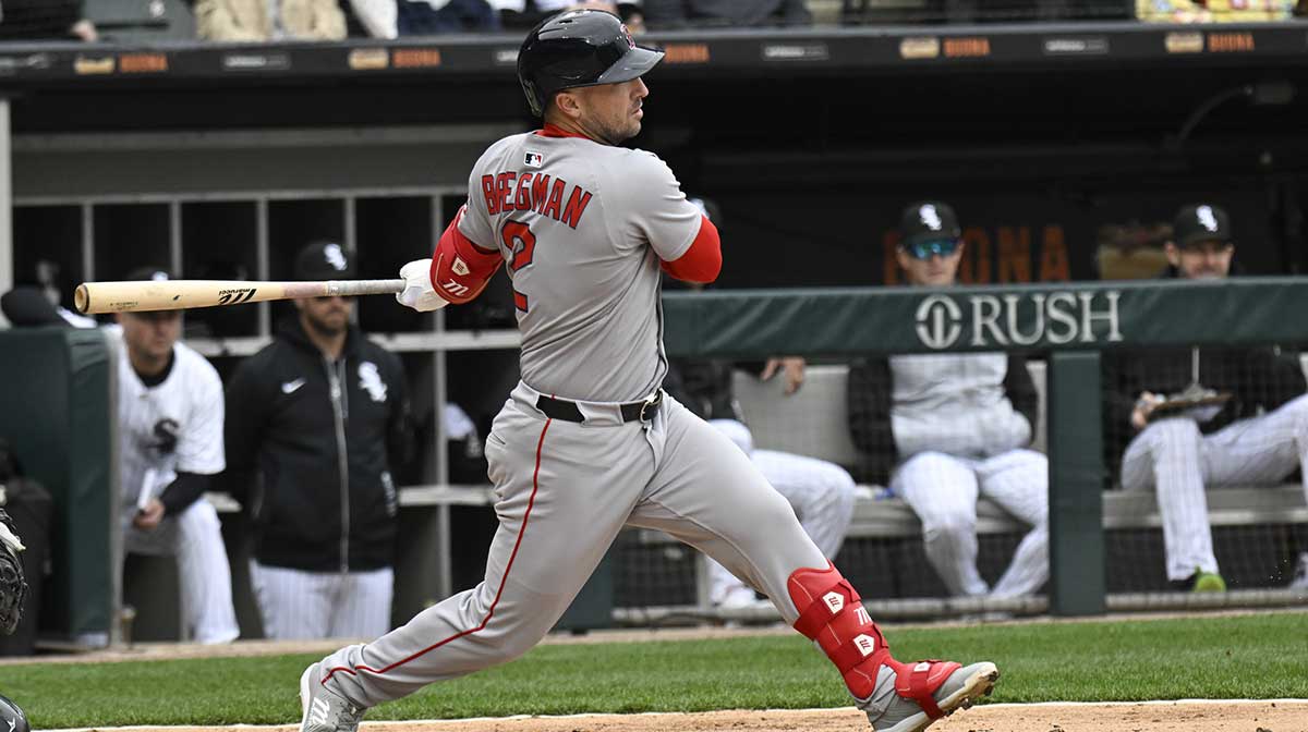 Boston Red Sox third base Alex Bregman (2) singles during the sixth inning against the Chicago White Sox at Guaranteed Rate Field.