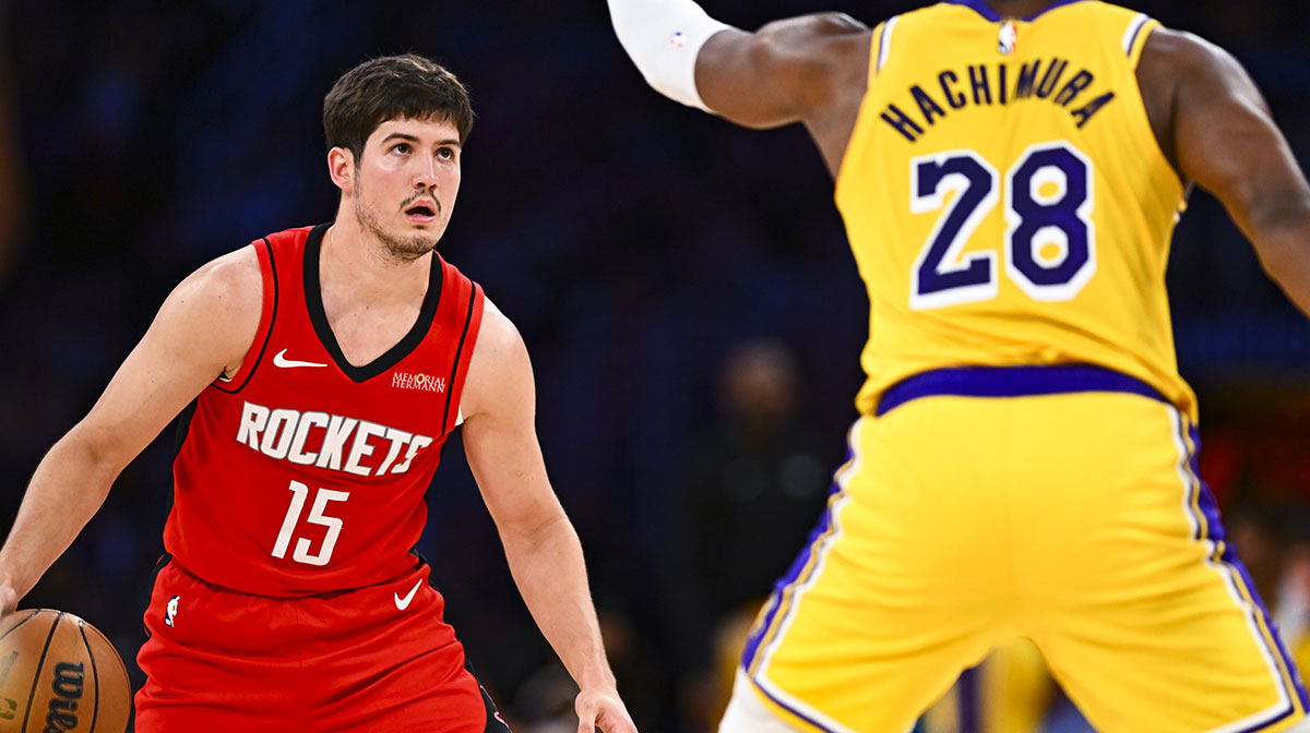 Houston Rockets guard Reed Sheppard (15) looks to shoot against Los Angeles Lakers forward Rui Hachimura (28) during the second half at Crypto.com Arena.