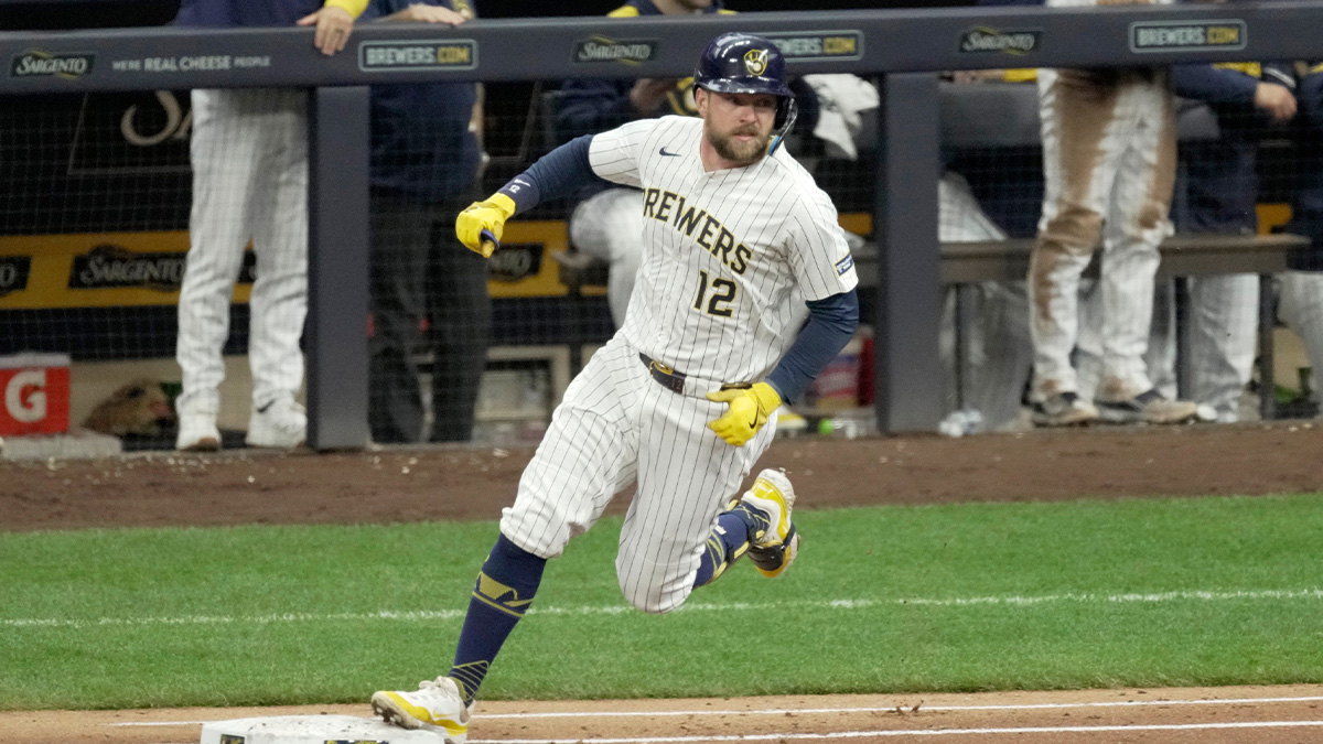 Milwaukee Brewers first baseman Rhys Hoskins (12) rounds the base after hitting a solo home run during the third inning of their game against the Oakland Athletics