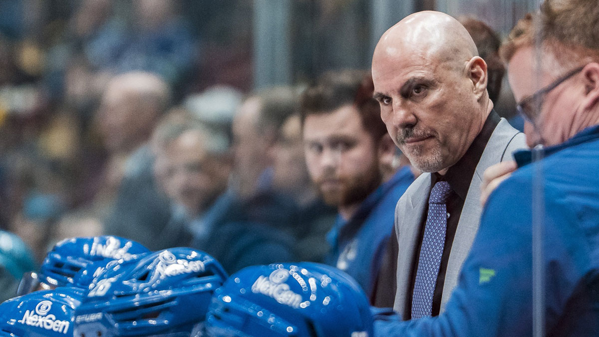 Vancouver Canucks head coach Rick Tocchet on the bench against the San Jose Sharks in the third period at Rogers Arena