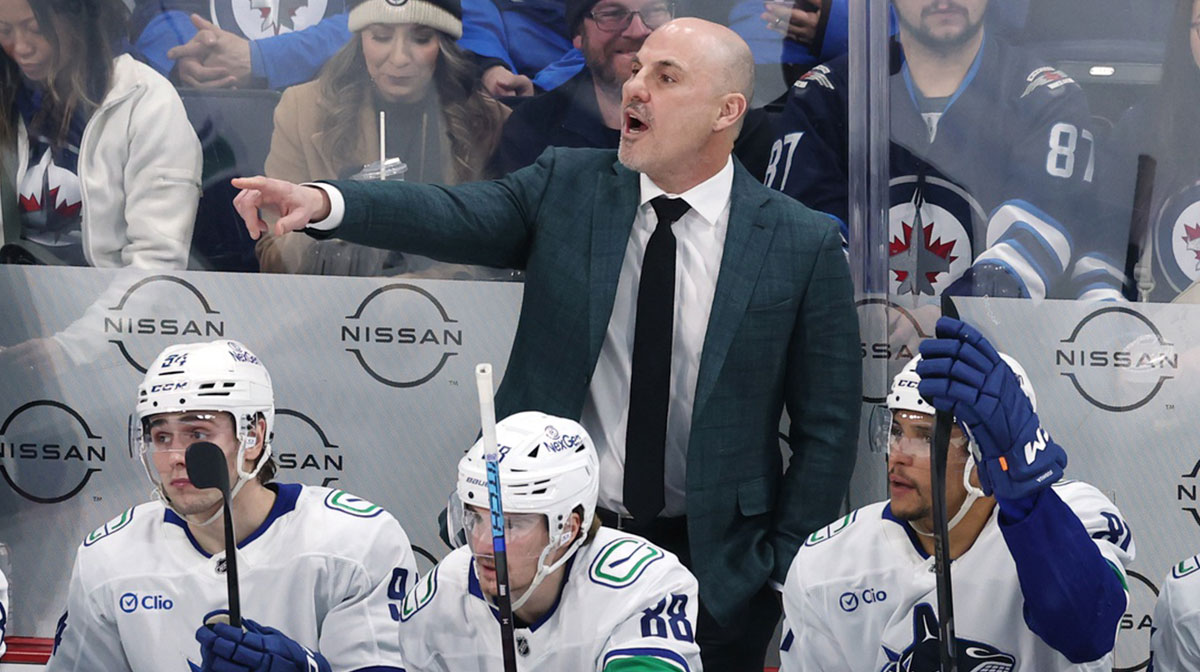 Vancouver Canucks head coach Rick Tocchet gestures during a game against the Winnipeg Jets in the third period at Canada Life Centre.
