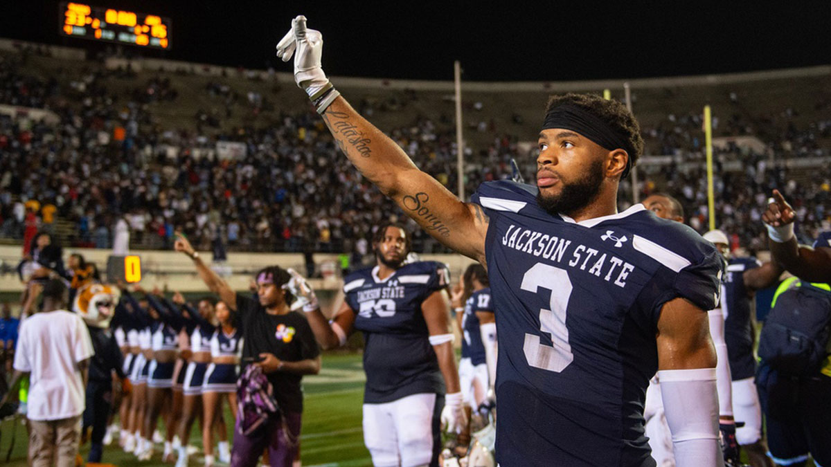 Jackson State Tigers' defensive back Robert McDaniel (3) stands for the alma mater