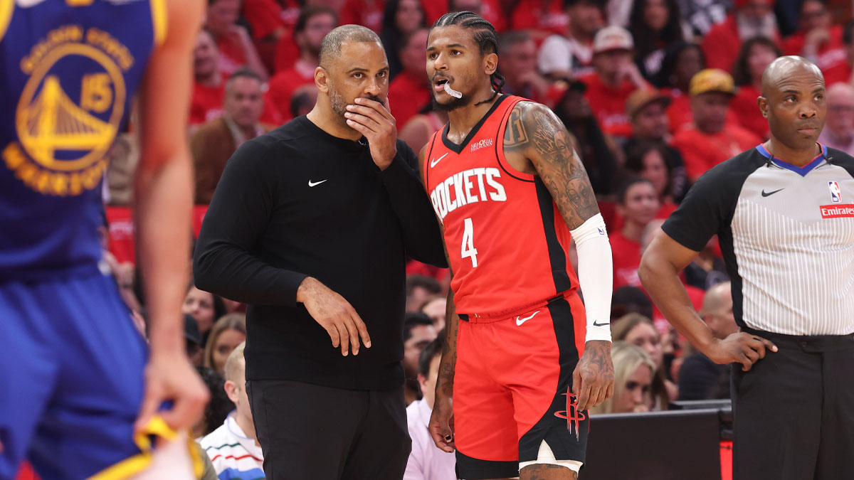 Rockets head coach Ime Udoka talks with guard Jalen Green (4)