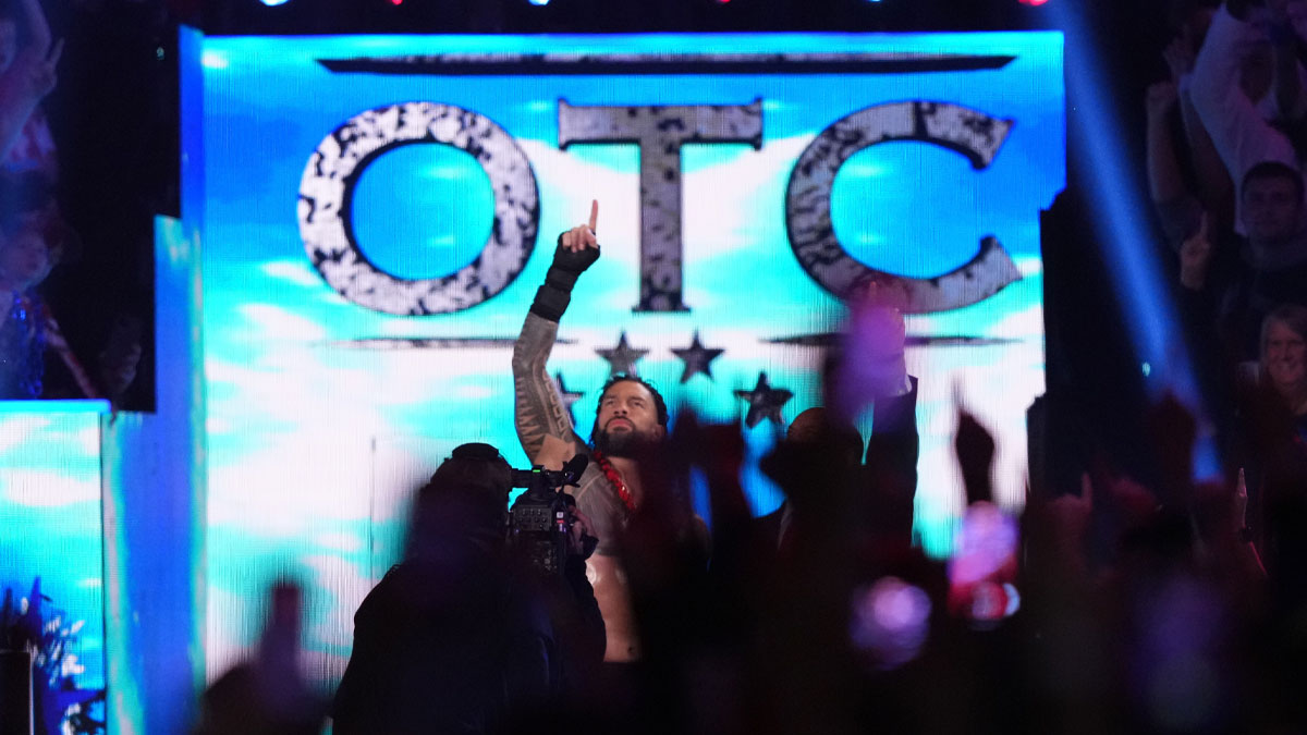 Roman Reigns making his entrance at the WWE Royal Rumble with his current theme music, which Jim Johnston discussed during a recent interview.