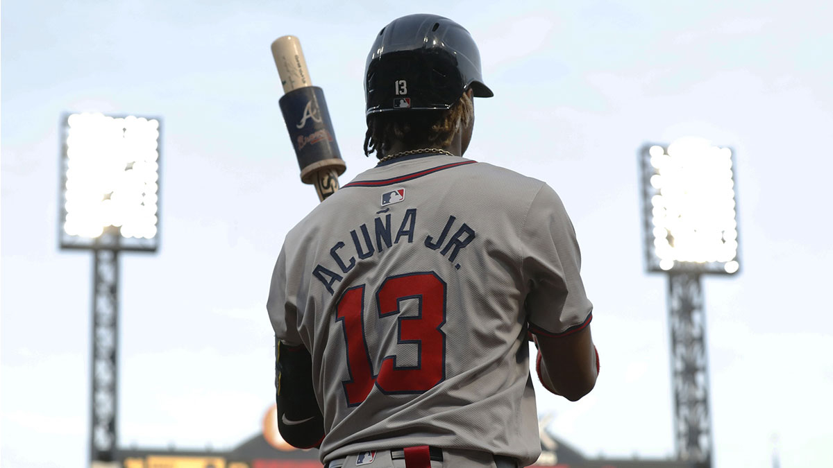 May 24, 2024; Pittsburgh, Pennsylvania, USA; Atlanta Braves right fielder Ronald Acuna Jr. (13) in the on-deck circle against the Pittsburgh Pirates during the fifth inning at PNC Park. Mandatory Credit: Charles LeClaire-Imagn Images