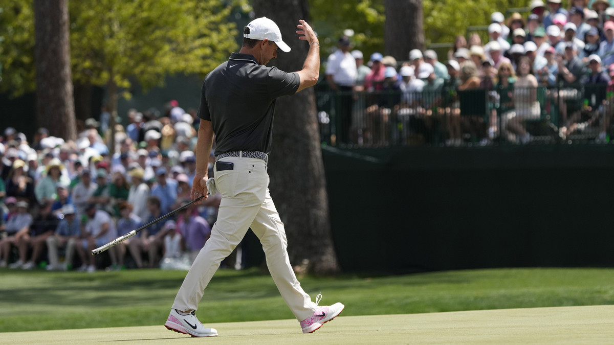 Rory McIlroy reacts after putting on the 15th green during the second round of the Masters Tournament at Augusta National Golf Club