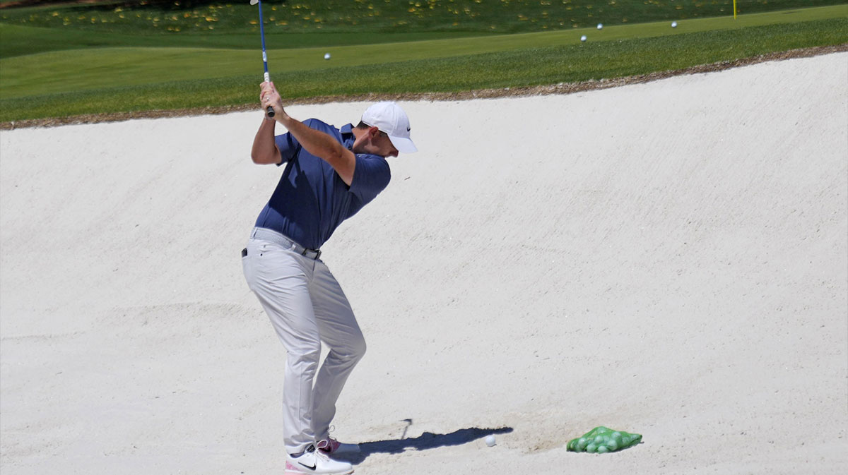 Rory McIlroy warms up from the practice bunkers during the final round of the Masters Tournament at Augusta National Golf Club