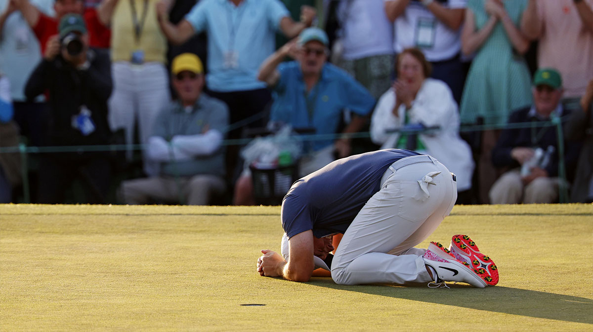 Rory McIlroy celebrates after winning in a playoff on the 18th green during the final round of the Masters Tournament at Augusta National Golf Club