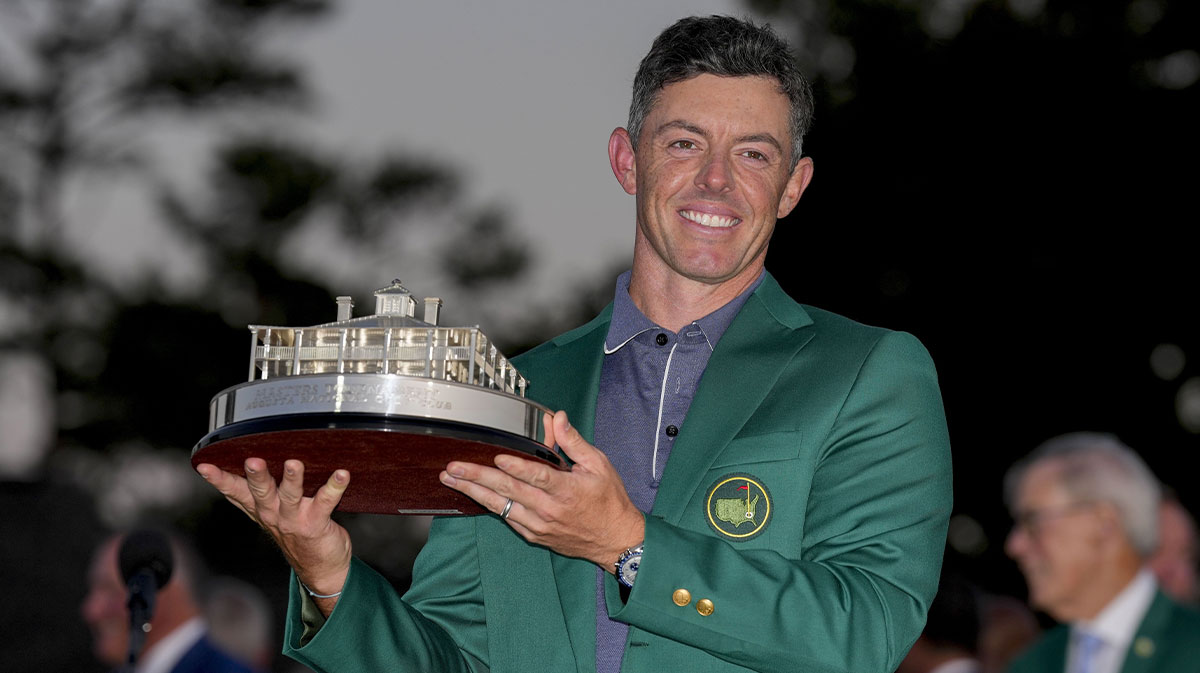 Rory McIlroy holds the Masters championship trophy during the final round of the Masters Tournament at Augusta National Golf Club.