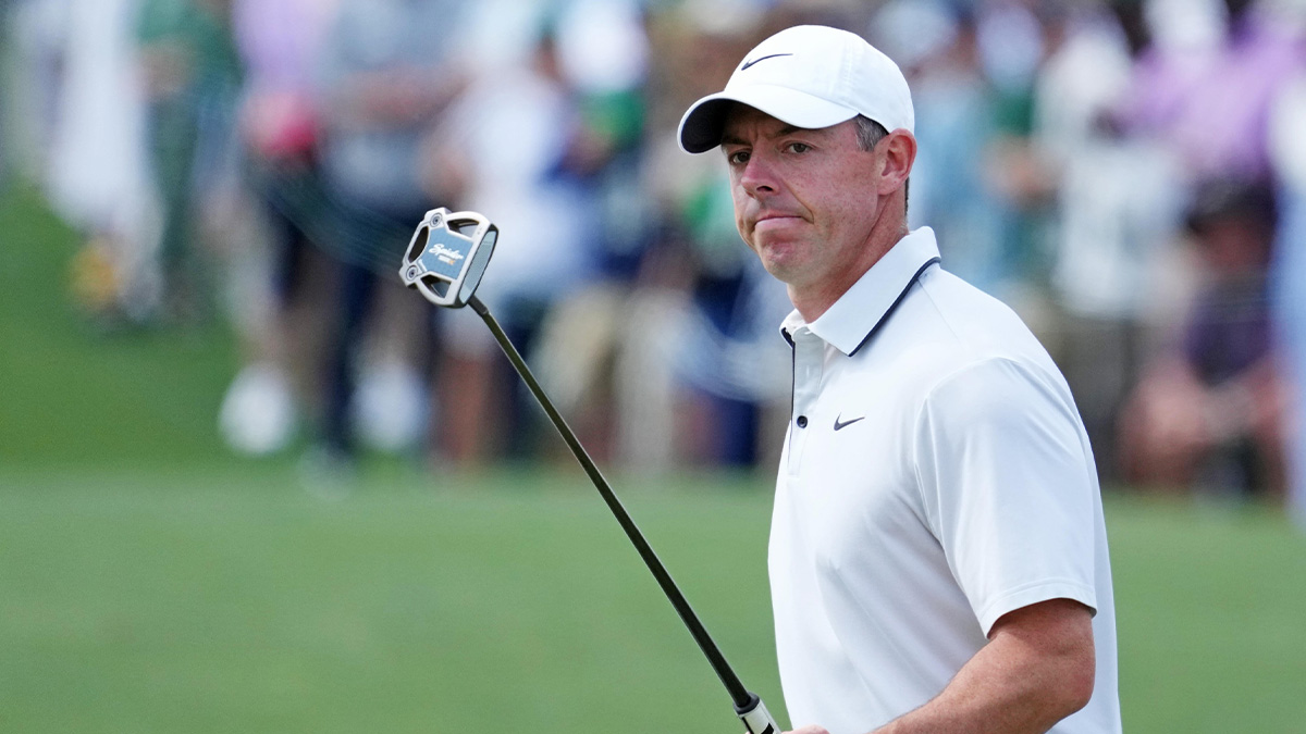 Rory McIlroy reacts after his putt on the seventh green during the third round of the Masters Tournament at Augusta National Golf Club.
