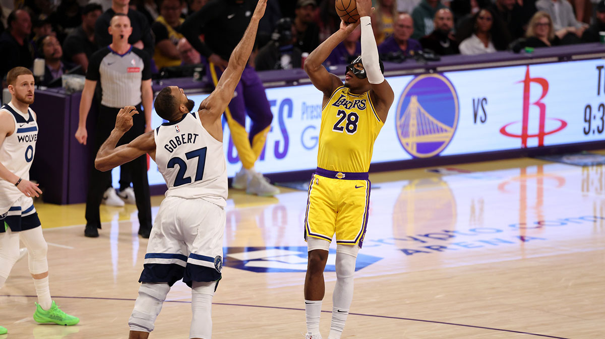 Los Angeles Lakers forward Rui Hachimura (28) shoots the ball over Minnesota Timberwolves center Rudy Gobert (27) during the third quarter of game two of first round for the 2024 NBA Playoffs at Crypto.com Arena.