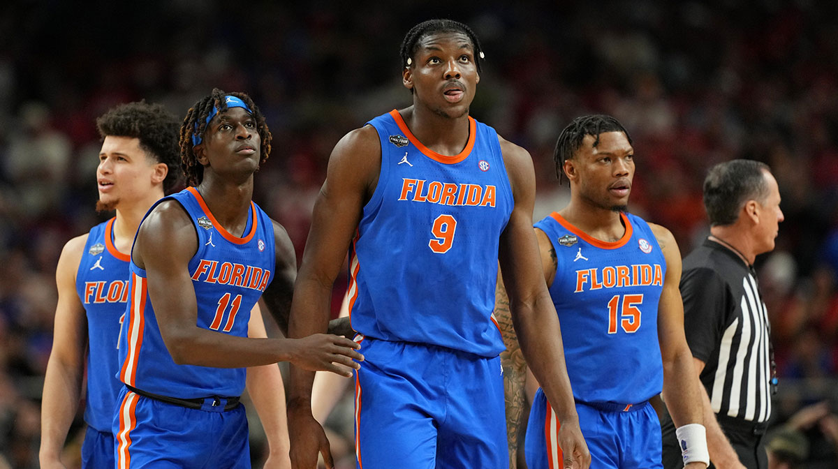 Florida Gators guard Denzel Aberdeen (11) and center Rueben Chinyelu (9) react after a play against the Houston Cougars during the second half of the national championship game of the Final Four of the 2025 NCAA Tournament at the Alamodome.