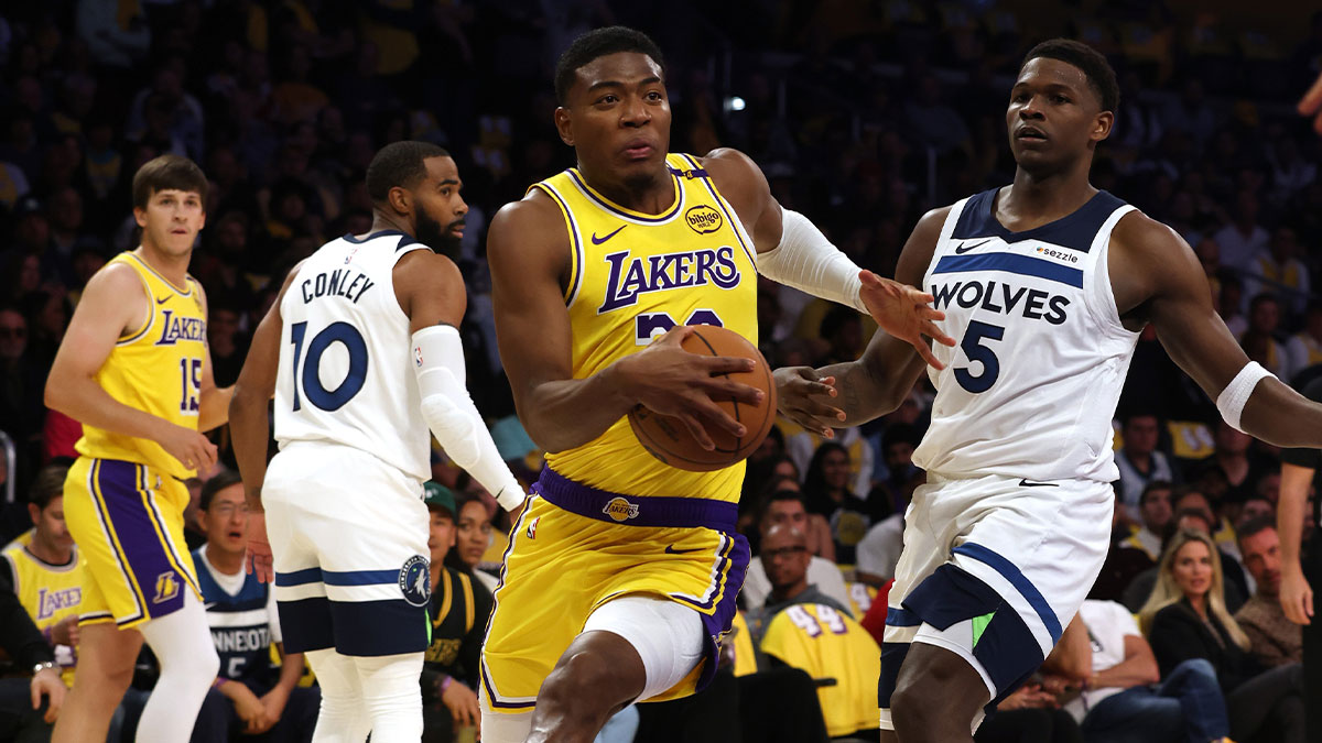 Los Angeles Lakers forward Rui Hachimura (28) drives against Minnesota Timberwolves guard Anthony Edwards (5) during the first quarter at Crypto.com Arena.
