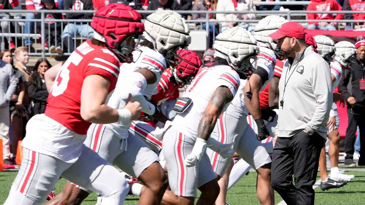 Ohio State Buckeye head coach Ryan Day watches his team warm up before the start of the spring game at Ohio Stadium on April 12, 2025.