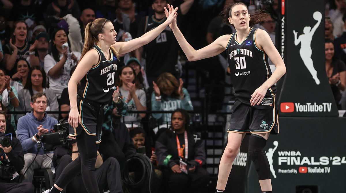 New York Liberty guard Sabrina Ionescu (20) and forward Breanna Stewart (30) during game five of the 2024 NBA Finals at Barclays Center.