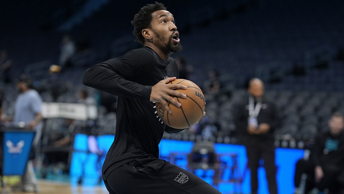 Sacramento Kings guard Malik Monk (0) shoots during pregame warm ups against the Charlotte Hornets at Spectrum Center.