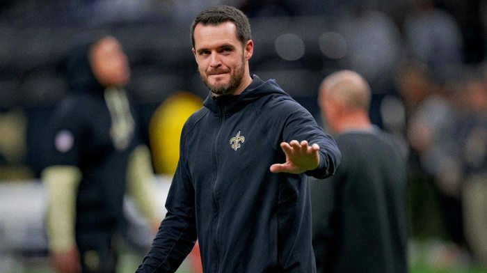 New Orleans Saints quarterback Derek Carr (4) walks the field before a game against the Las Vegas Raiders at Caesars Superdome.