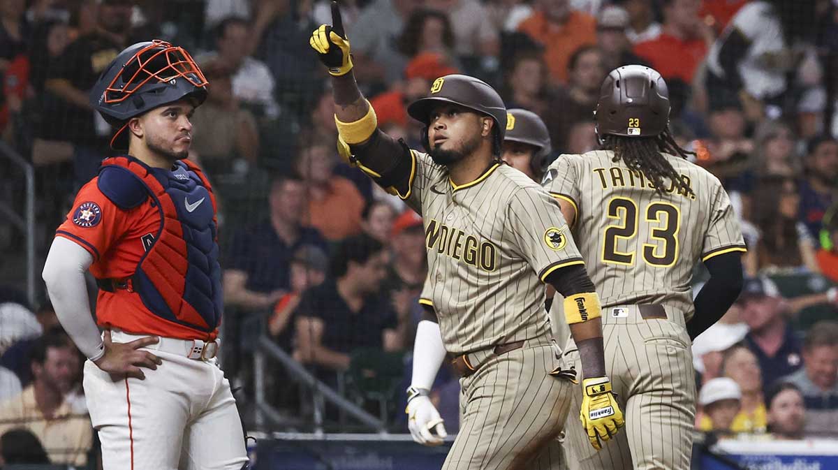 San Diego Padres first baseman Luis Arraez (4) points up after hitting a home run during the seventh inning against the Houston Astros at Daikin Park.
