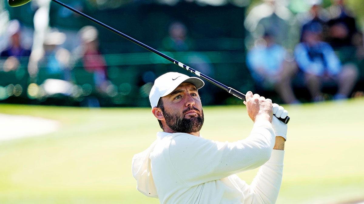 Scottie Scheffler hits from the third tee during a practice round for the Masters Tournament at Augusta National Golf Club.