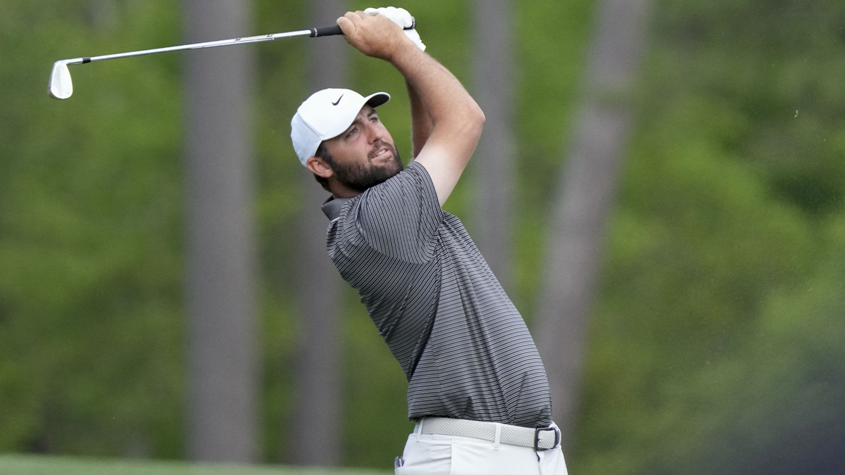 Scottie Scheffler tees off on no. 12 during the third round of the Masters Tournament at Augusta National Golf Club.
