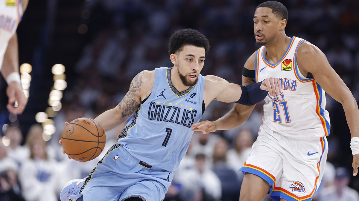 Memphis Grizzlies guard Scotty Pippen Jr. (1) dribbles down the court beside Oklahoma City Thunder guard Aaron Wiggins (21) during the second half at Paycom Center.