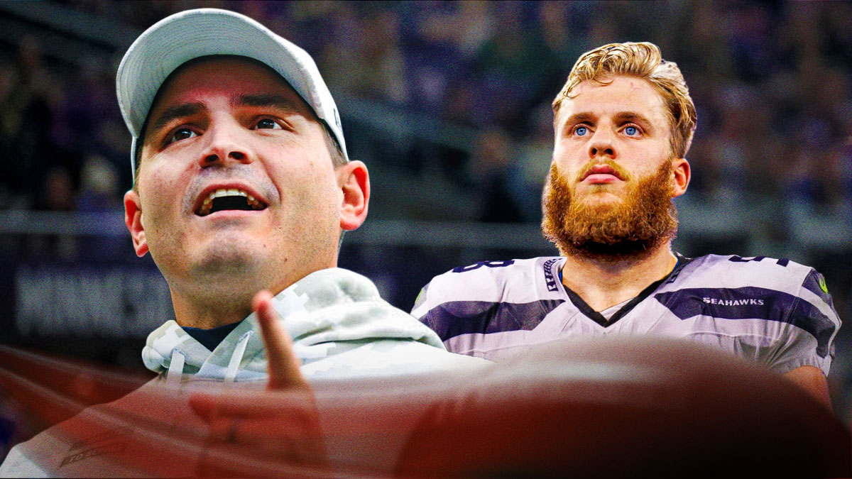 Seahawks coach Mike MacDonald looking excited, with Cooper Kupp in a Seahawks jersey standing next to him
