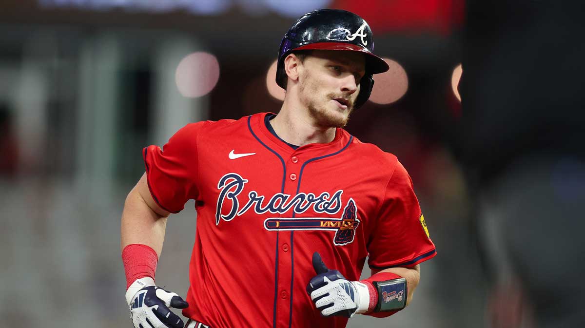 Atlanta Braves catcher Sean Murphy (12) hits a two-run home run against the Kansas City Royals in the fourth inning at Truist Park.