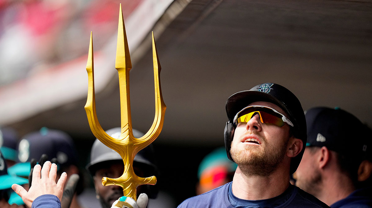 Seattle Mariners outfielder Luke Raley (20) celebrates a two-run home run in the fourth inning of the MLB Interleague game between the Cincinnati Reds and the Seattle Mariners at Great American Ball Park in downtown Cincinnati on Thursday, April 17, 2025. The Mariners beat the Reds, 11-7, in 10 innings.