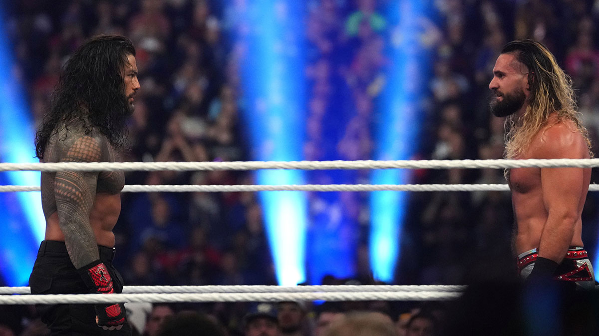 Roman Reigns and Seth Rollins during the Men’s Royal Rumble match during the WWE Royal Rumble at Lucas Oil Stadium.