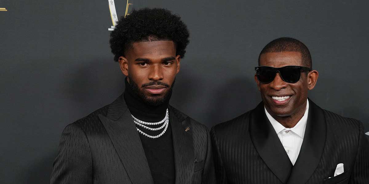 Deion Sanders (right) with his son Shedeur Sanders on the red carpet before Super Bowl LIX NFL Honors at Saenger Theatre