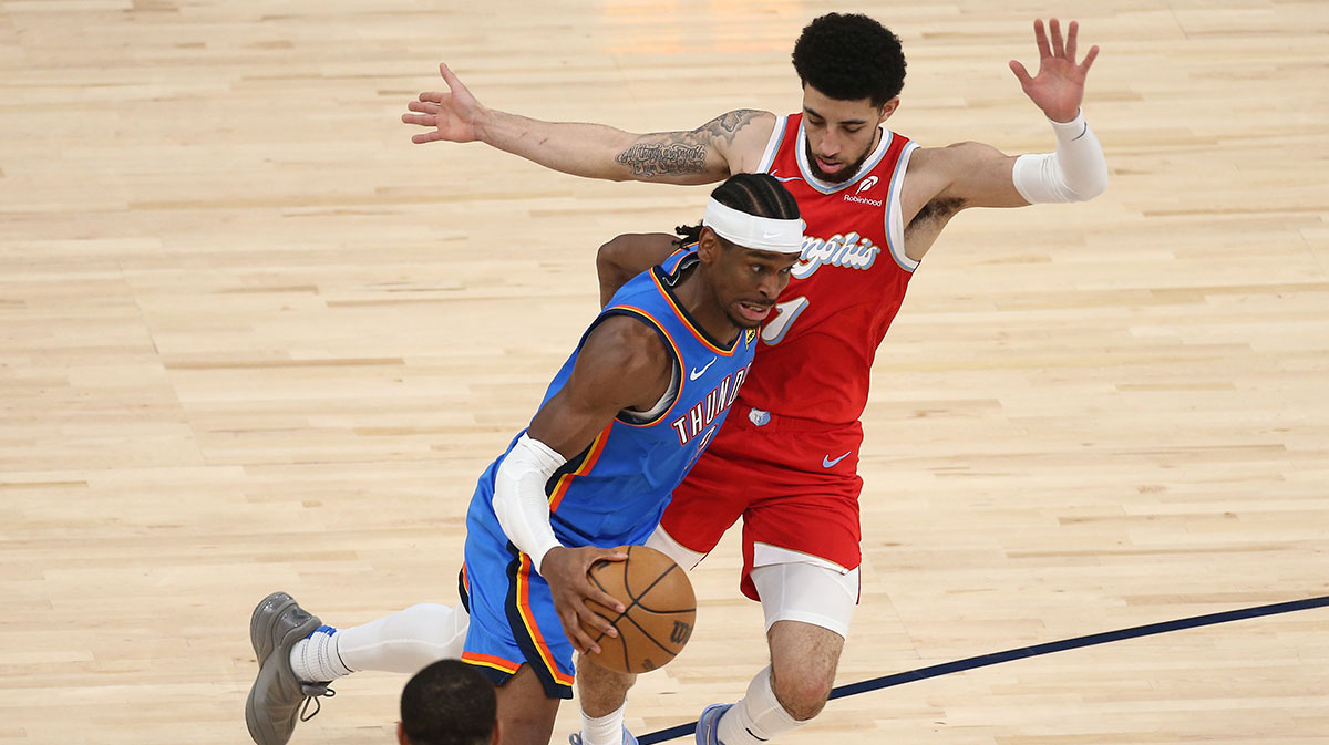 Oklahoma City Thunder guard Shai Gilgeous-Alexander (2) drives to the basket as Memphis Grizzlies guard Scotty Pippen Jr. (1) defends during the third quarter during game four for the first round of the 2024 NBA Playoffs at FedExForum.