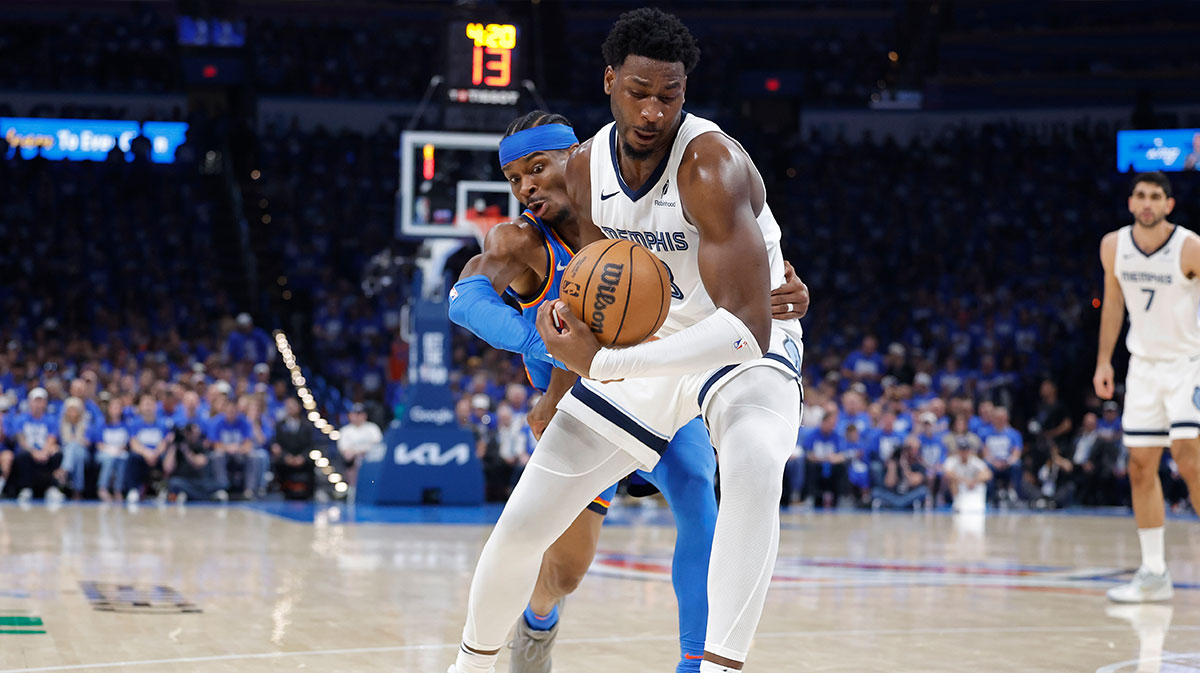 Oklahoma City Thunder guard Shai Gilgeous-Alexander (2) reaches to steal the ball from Memphis Grizzlies forward Jaren Jackson Jr. (13) in the third quarter during game two of first round for the 2024 NBA Playoffs at Paycom Center.